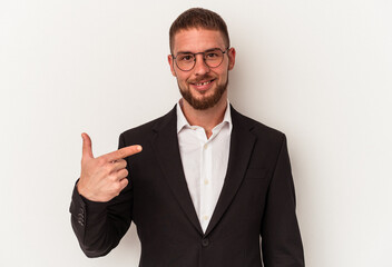 Young business caucasian man isolated on white background person pointing by hand to a shirt copy space, proud and confident