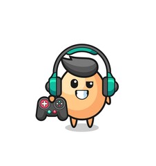 Fototapeta premium egg gamer mascot holding a game controller