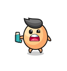 egg mascot having asthma while holding the inhaler