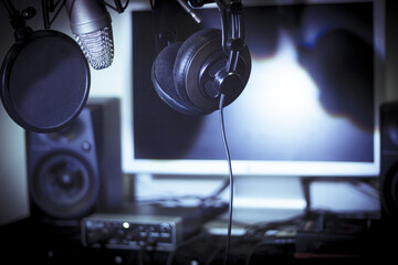 Announcer microphone on recording studio background