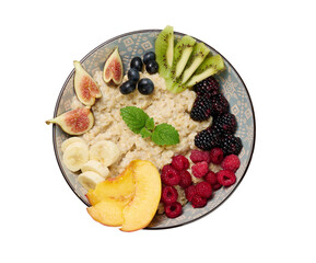 boiled oatmeal with fruits in a round plate on a white isolated background, top view