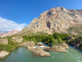 Naklejka na ściany i meble Mountains in Saritag camping village near Iskanderkul lake in Tajikistan