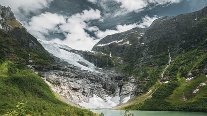 Naklejka na ściany i meble Jostedalsbreen National Park, Sogn Og Fjordane County, Norway. Boyabreen Glacier In Spring Sunny Day. Famous Norwegian Landmark And Popular Destination. 4K
