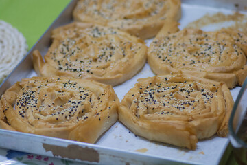 Homemade crispy rolled Burek, Filo pastry with cheese with sesame and nigella