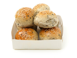 small round breads with sesame on white background
