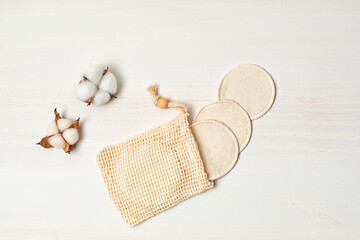 Reusable cotton pads for makeup removal. Sustainable, eco friendly, zero waste personal hygeinie concept. Top view, flat lay © netrun78