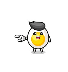 boiled egg cartoon with pointing left gesture