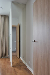 mirror on the end of the white closet in the bedroom