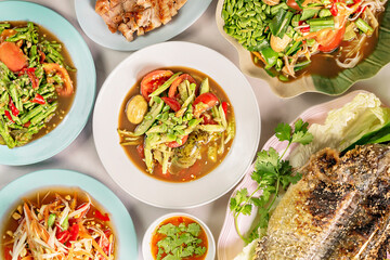 thai spicy food and grilled fish
