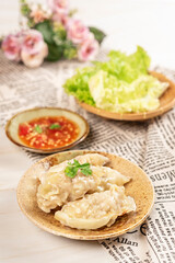 Chinese dumplings filled with pork and spring onions.