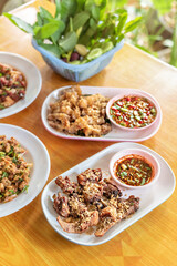 fried crispy pork served with spicy chili sauce