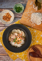 rice noodle soup with pork and vegetables