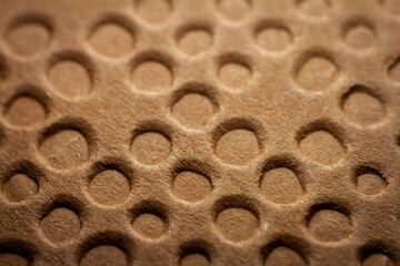 Extreme macro of embossed brown paper