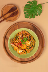 stir fried herbal vegetables with seafood and curry powder