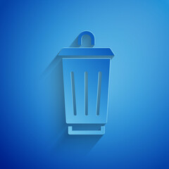 Paper cut Trash can icon isolated on blue background. Garbage bin sign. Recycle basket icon. Office trash icon. Paper art style. Vector