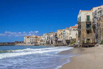 Fototapeta na wymiar Beach in historic part of Cefalu town on Sicily Island, Italy