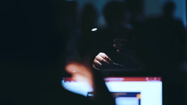 An online translator gestures with his hands at the event