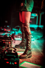 Fototapeta na wymiar singer in leather boots