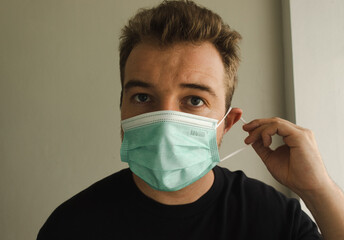 Young man wearing a mask 