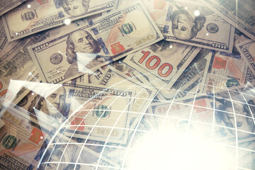 Double exposure of world map drawing over us dollars bill background. International concept.