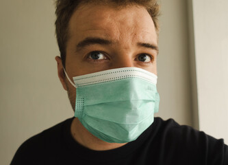 Young man wearing a mask 