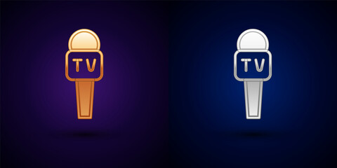 Gold and silver Microphone icon isolated on black background. On air radio mic microphone. Speaker sign. Vector