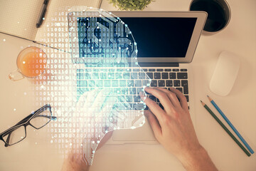 Double exposure of man's hands typing over computer keyboard and brain hologram drawing. Top view. Ai and data technology concept.