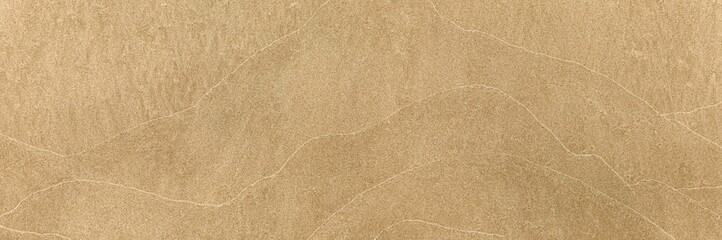Panorama of Sand texture. Sandy beach for background. Top view. Natural sand stone texture...
