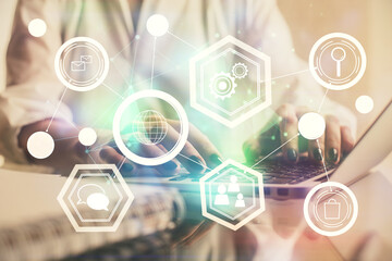 Double exposure of woman hands typing on computer and social network theme hologram drawing. People media concept.