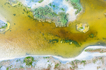 amazing panorama of Lake Elton on a summer day, beautiful sky with clouds and its reflection in the water