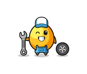 Fototapeta premium the golden egg character as a mechanic mascot