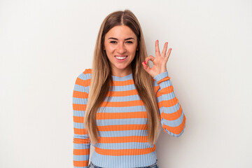 Young Russian woman isolated on white background cheerful and confident showing ok gesture.