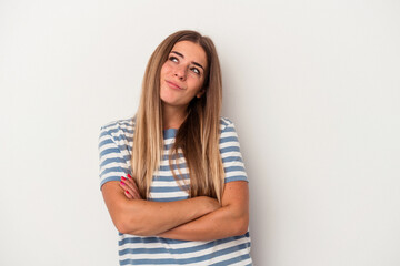 Young Russian woman isolated on white background funny and friendly sticking out tongue.