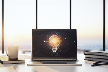 Modern computer monitor with creative light bulb hologram, research and development concept. 3D...