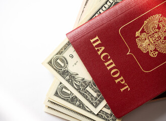 A foreign passport and dollars on a white isolated background.
