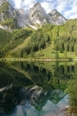 Fototapeta na wymiar Reflections on the Vorderer Gosausee (lower lake), Salzkammergut, Styria, Austria, Europe