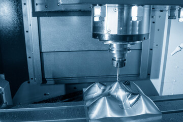 The CNC milling machine cutting the  mold parts by solid ball end mill tool type.