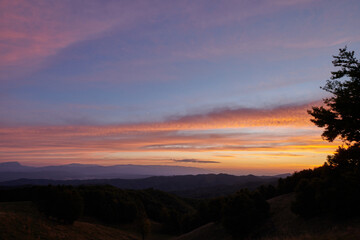 Beautiful red sunset from a top of a hill