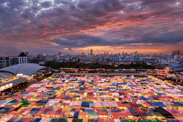 Bird eyes view of Multi-colored tents /Sales of second-hand market at twilight.