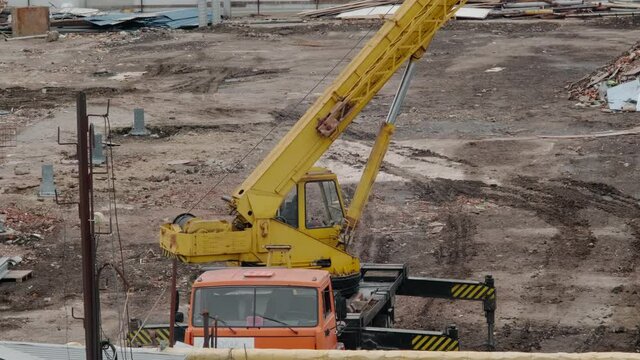 truck with crane on construction site