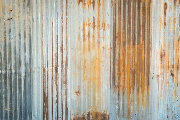 Surface of old rusted zinc plate sheet of home closeup background.