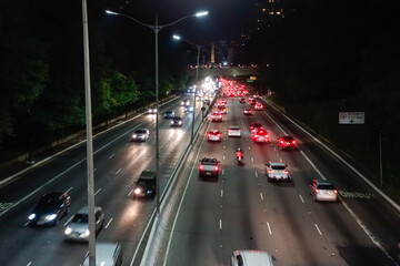 freeway in Sao Paulo city at night, car traffic and lights