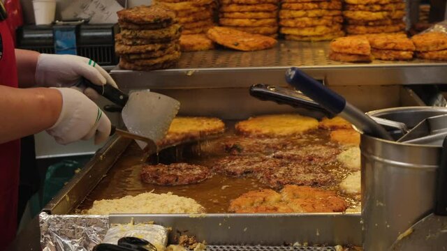 Frying pancakes at Gwangjang Market in Seoul South Korea