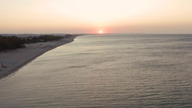 Aerial view of beautiful sea and beach at sunrise, seascape, Simeri Mare, Calabria, Southern Italy