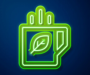 Glowing neon line Cup of tea and leaf icon isolated on blue background. Vector