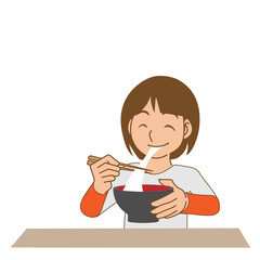 雑煮を食べる日本人の女の子