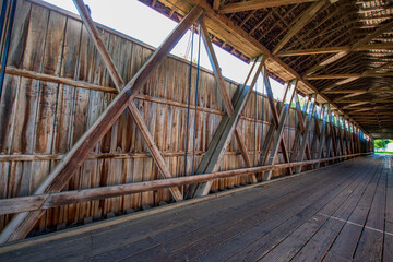 Fototapeta na wymiar Support beams inside covered bridge