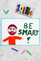 Colorful drawing: Smiling teacher with beard and word BE SMART next to him