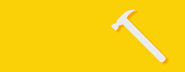Hammer Sign Concept on yellow background. Horizontal web banner with copy space, template.