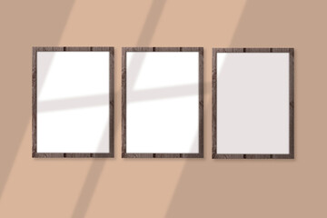 Classic and universal poster mockup. 3 frames on wall